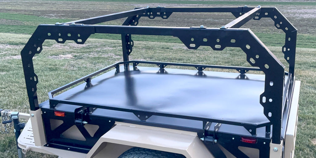 Black modular rack and railed lid on a tan Slack Wagon
