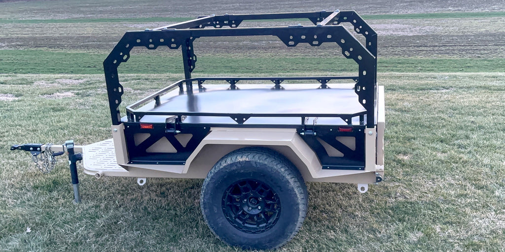 Tan Slack Wagon trailer with modular rack, side view
