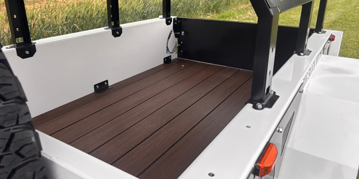 Slack Wagon cargo bed with composite deck boards and rack uprights