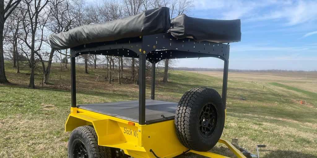 Yellow Slack Wagon trailer with modular rack and spare tire